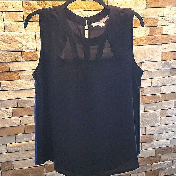 Forever 21 Tops - Black cut-out  sleeve-less blouce "FINAL PRICE"